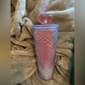 Pink Starbucks cup with jewel on top. Valentines 2022 overseas cup.